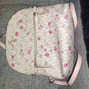 Michael Kors “Dallas” Vanilla Multi Slim Backpack.